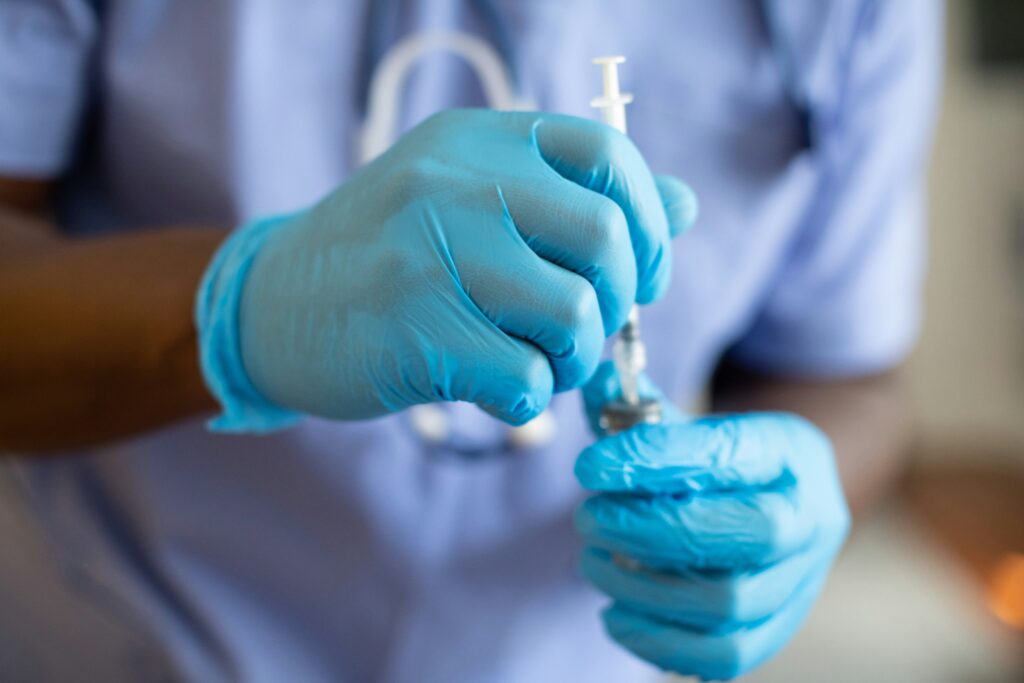 hands holding injection