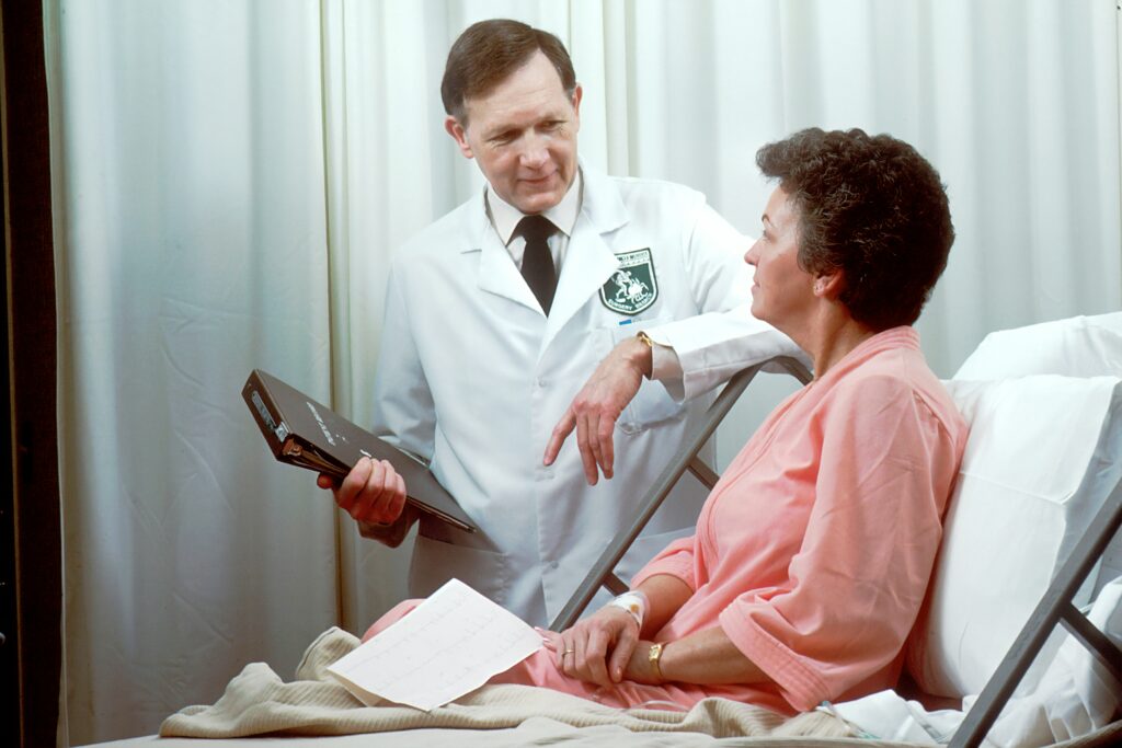 A doctor communicating with patient.